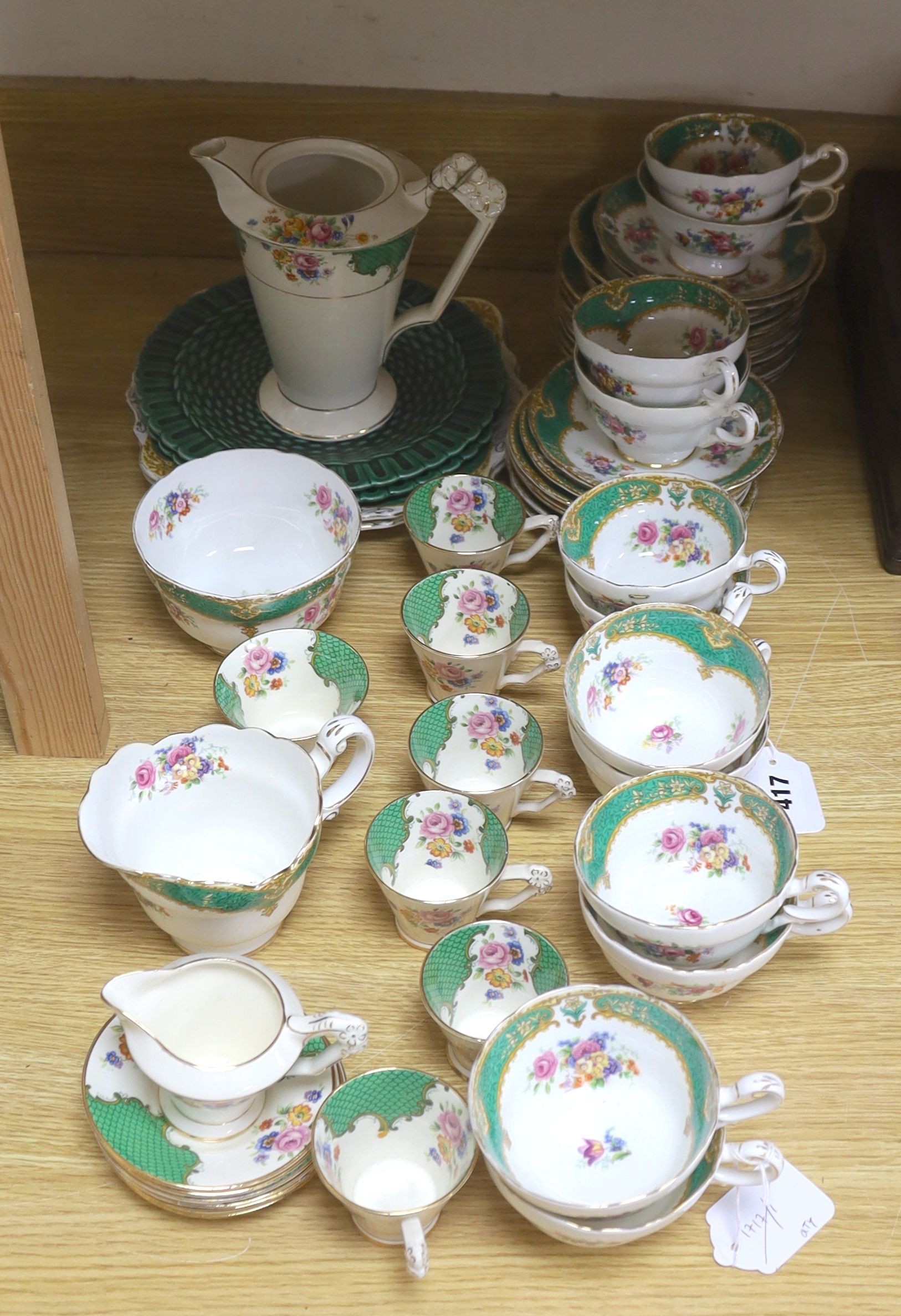 A quantity of Paragon bone china 15 piece part tea and coffee set and two Victorian green glazed wicker effect plates